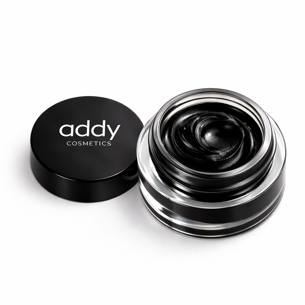 Black cosmetic jar with lid on a white background, featuring the 'addy' brand.