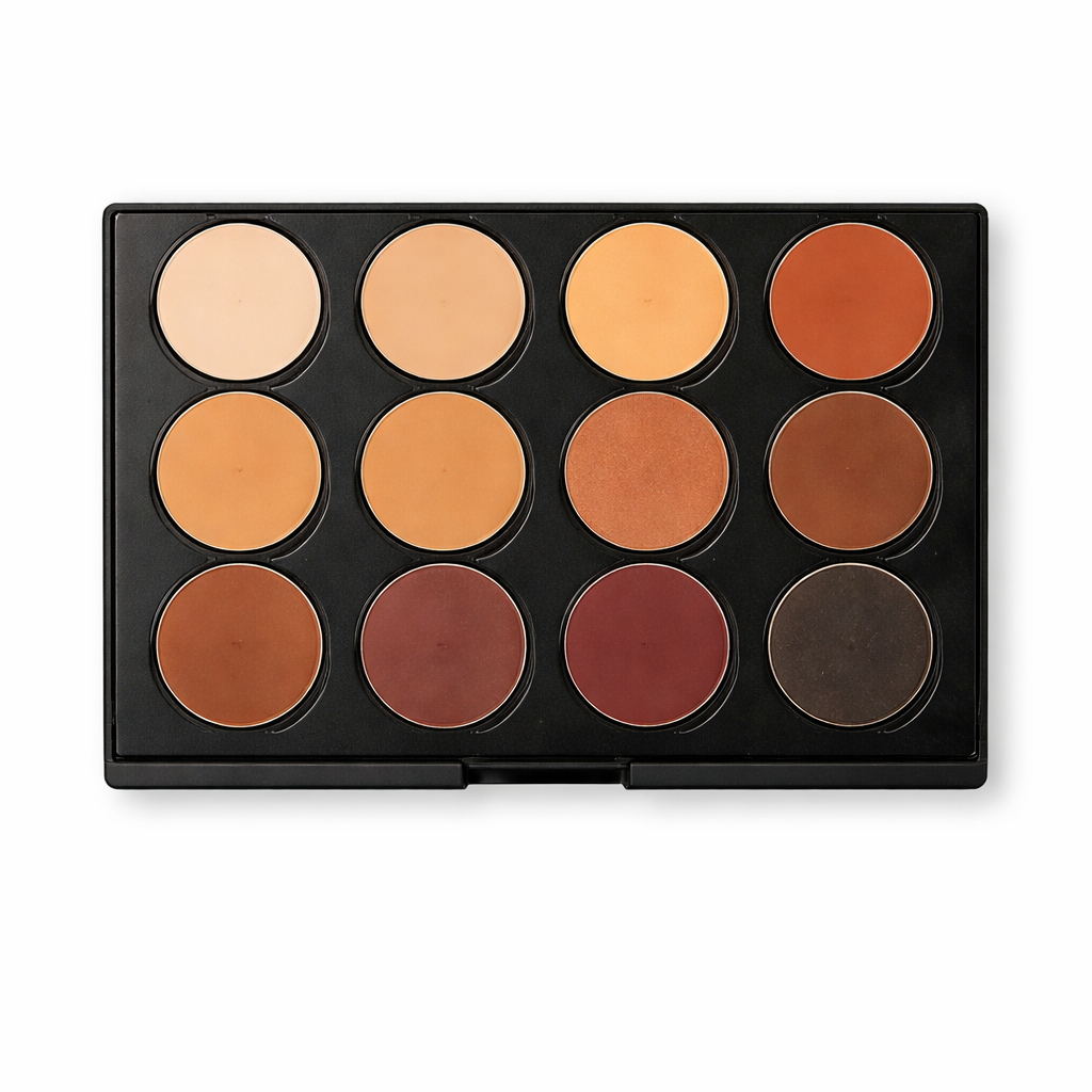 Makeup palette with various shades of brown and orange on a white background