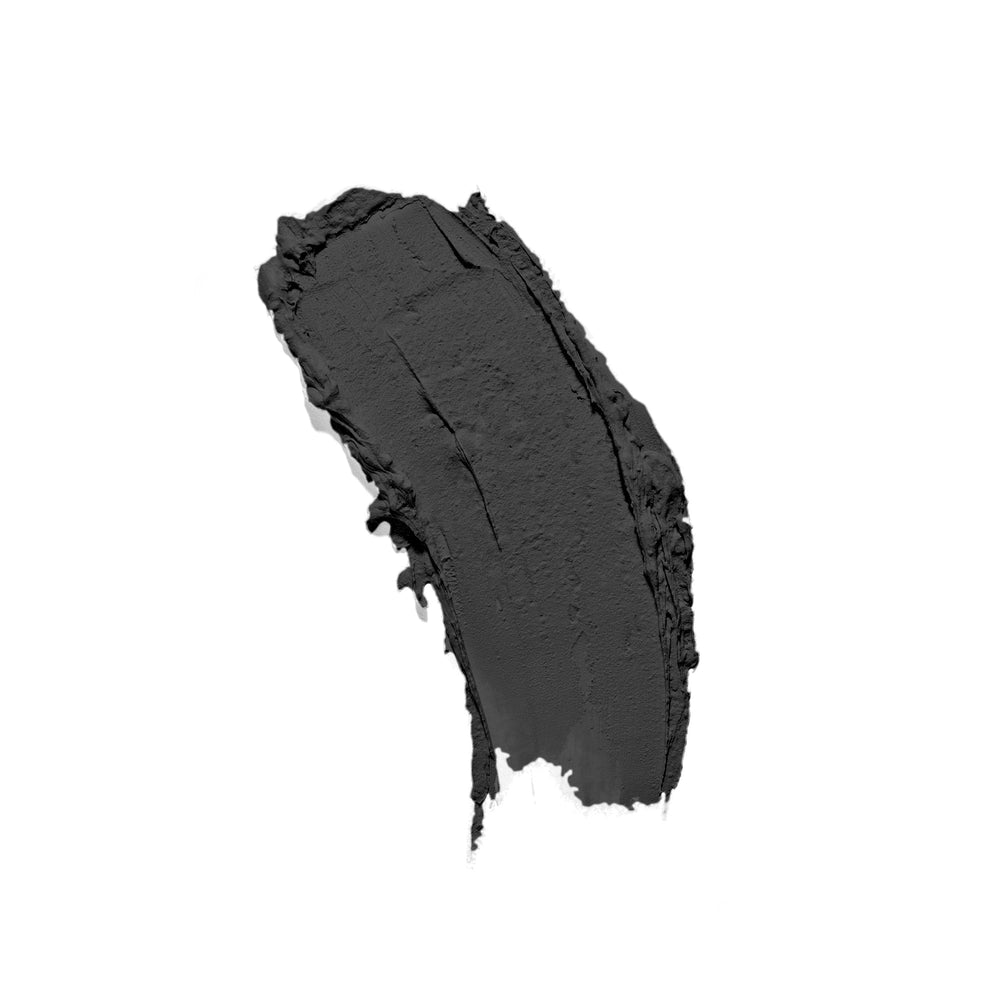 Grey makeup swatch on a white background
