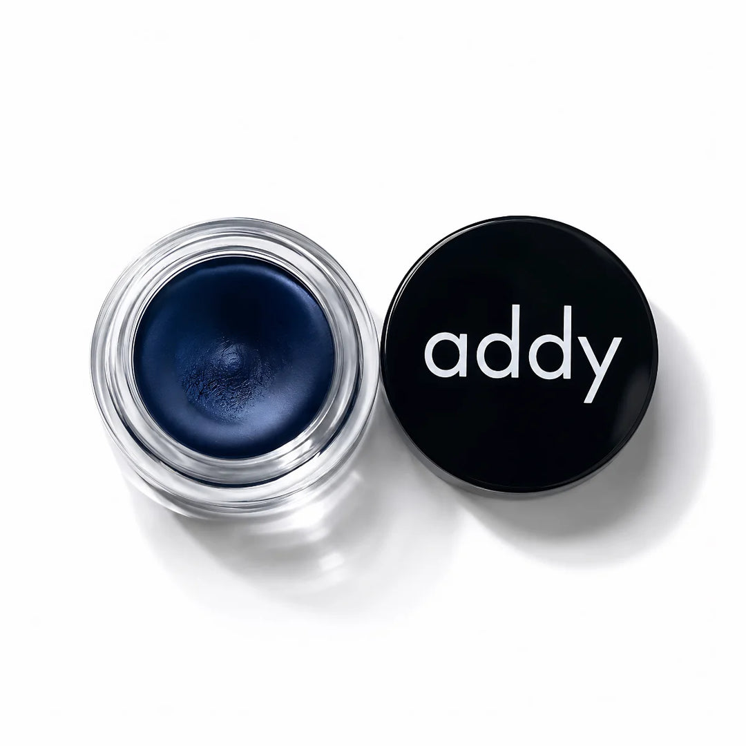 Blue eye cream in a jar with &